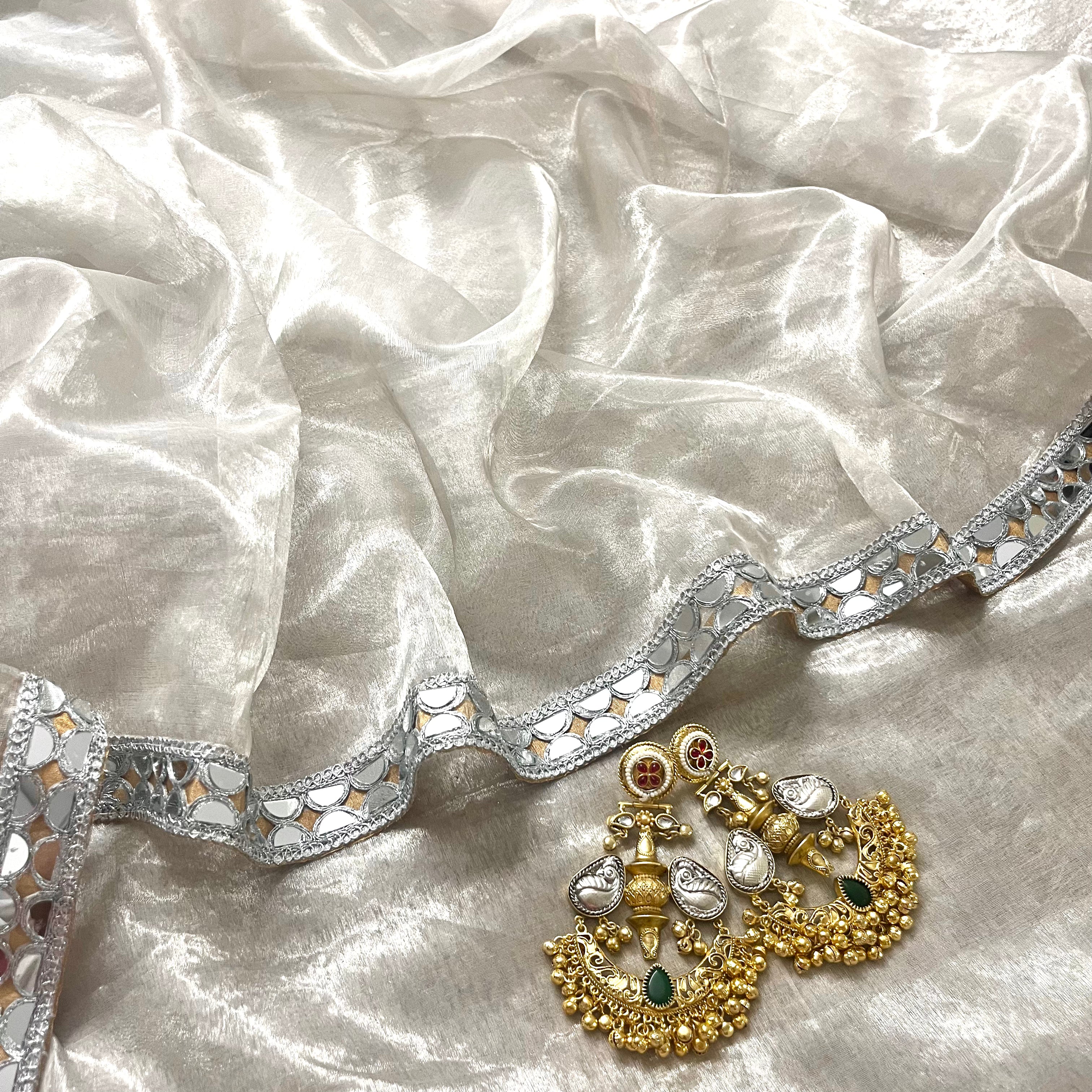 Molten silver and gold chanderi tissue silk saree with mirror work border