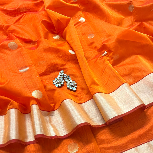 Orange chanderi saree with zari bootis all over