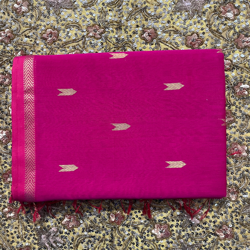Rani pink maheshwari saree with zari border and zari bootis all over