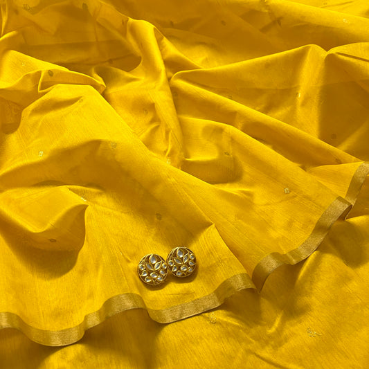 Yellow chanderi saree with zari bootis all over