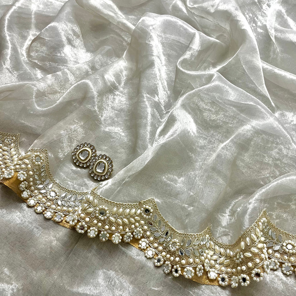 Molten silver chanderi tissue silk saree with pearl and mirror work border