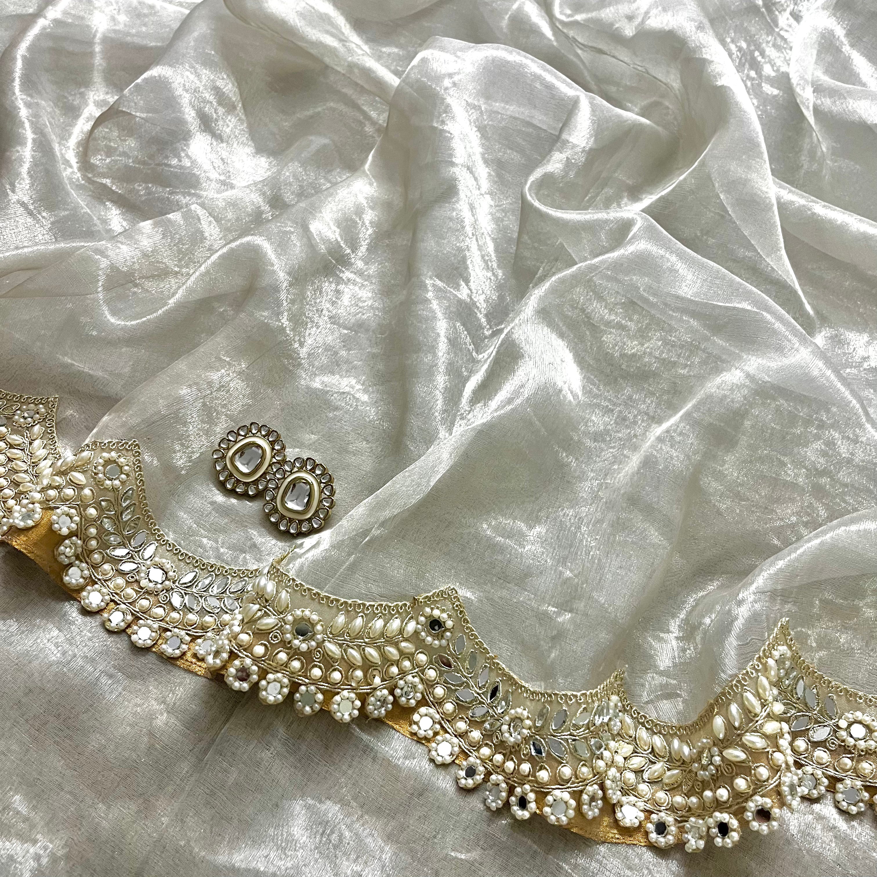 Molten silver chanderi tissue silk saree with pearl and mirror work border