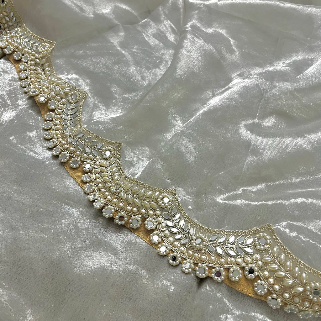 Molten silver chanderi tissue silk saree with pearl and mirror work border