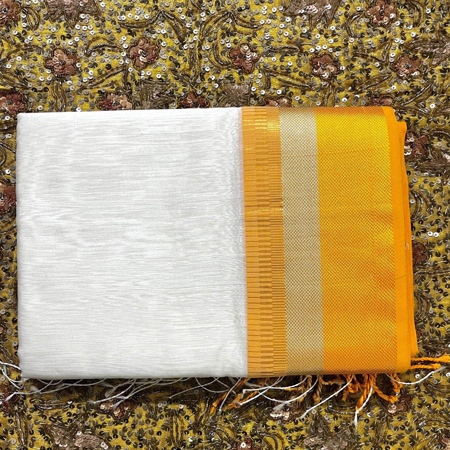 White and yellow maheshwari saree with resham border