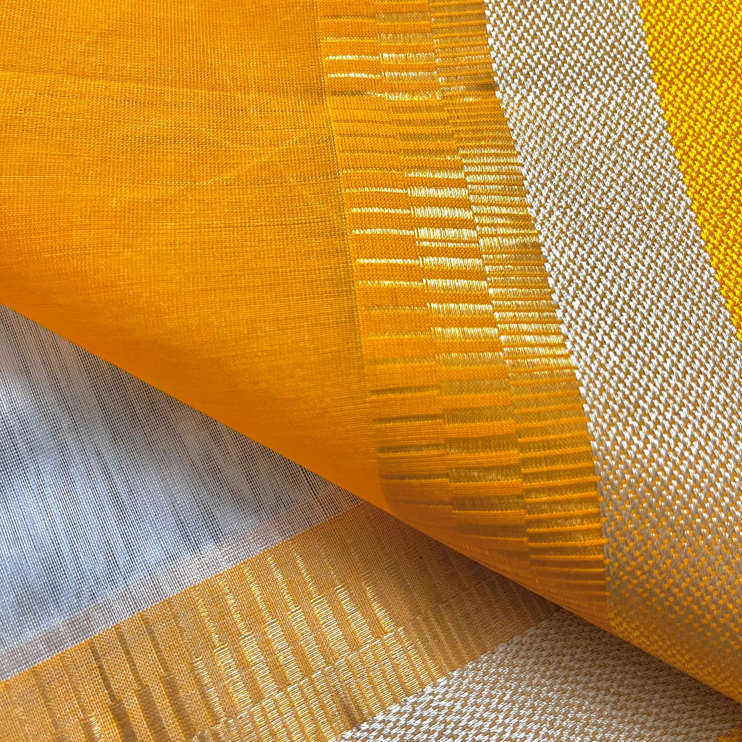 White and yellow maheshwari saree with resham border