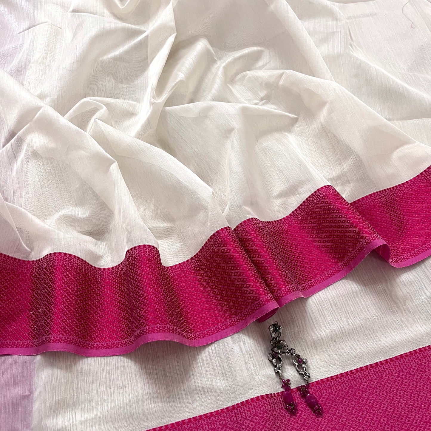 White and pink maheshwari saree with resham border