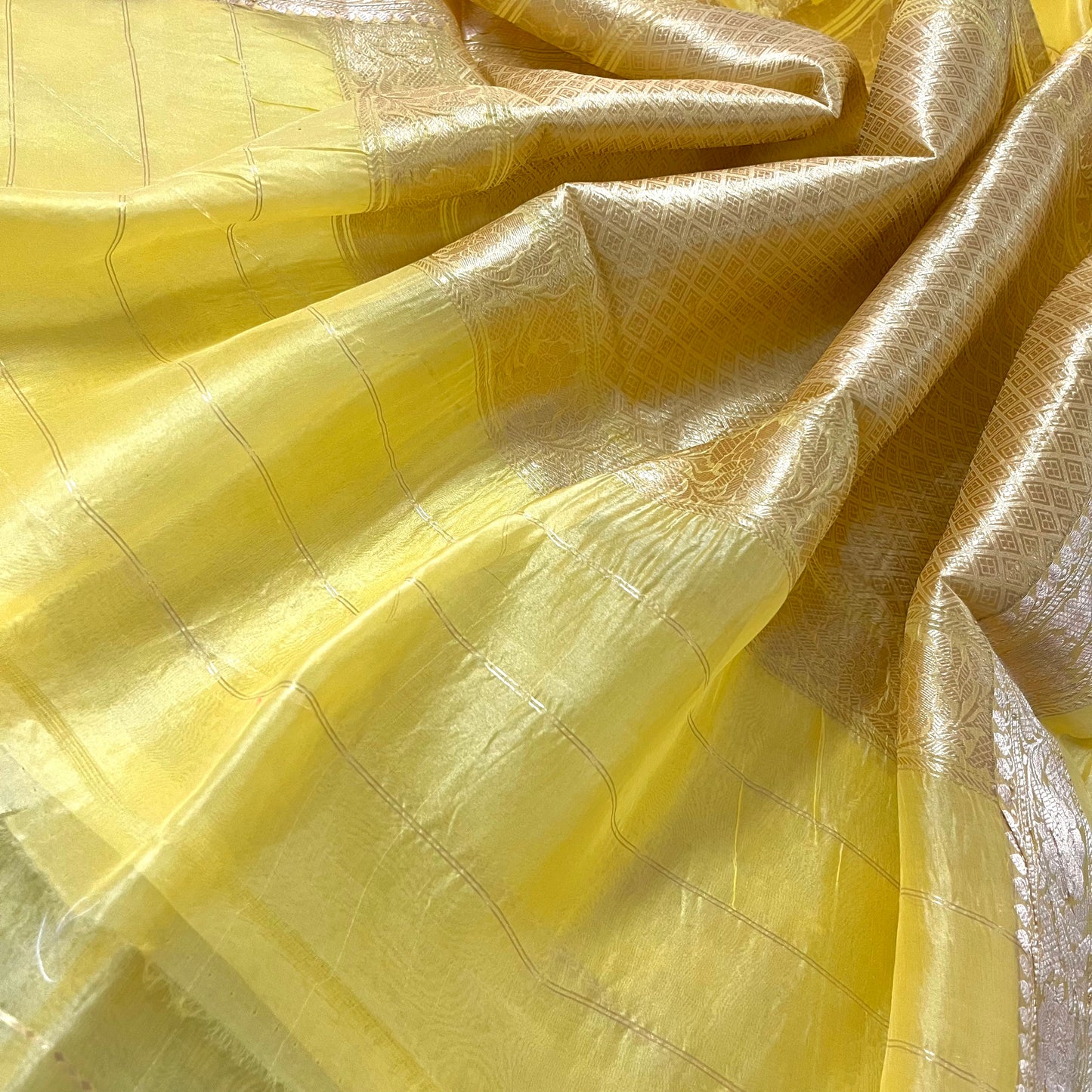 Light yellow banarasi silk saree with zari bel all over
