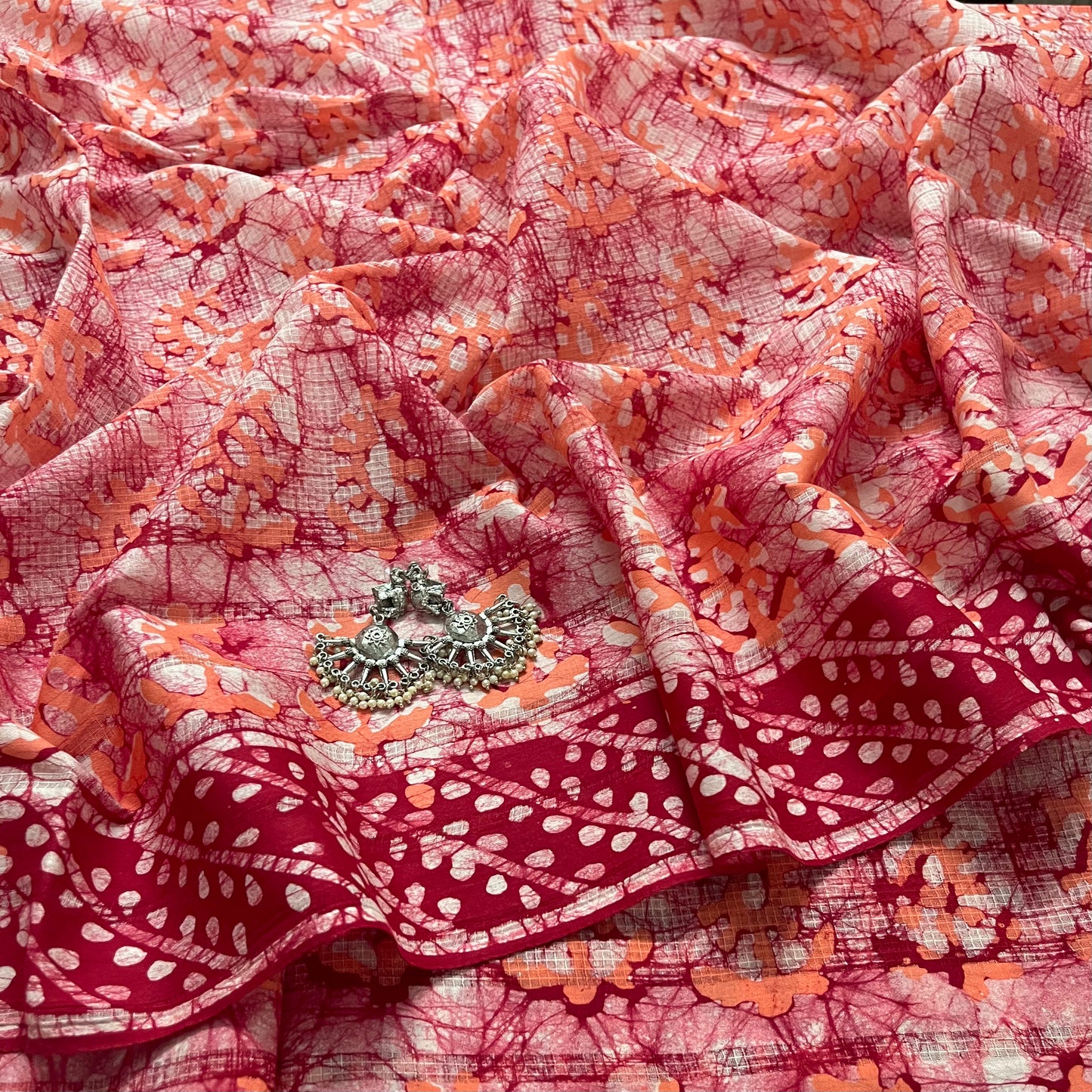Off white, orange & red batik print saree