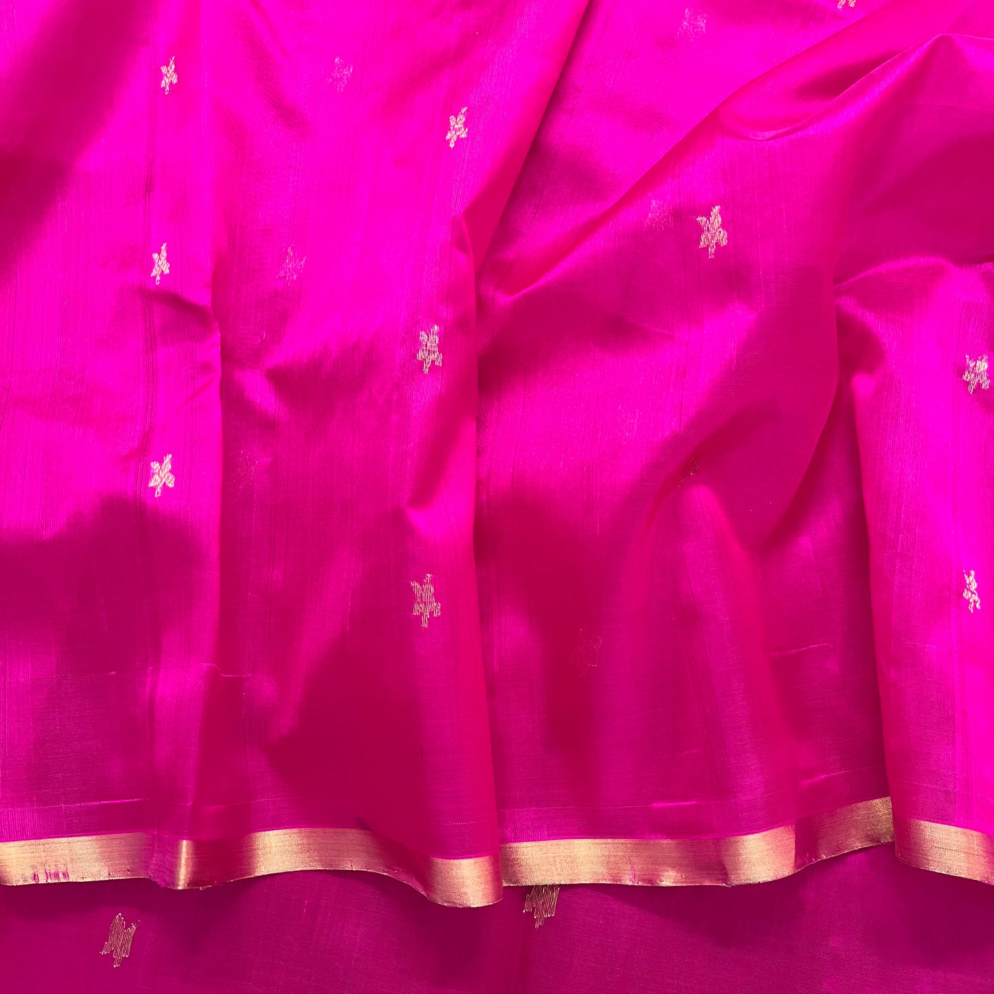 Rani pink chanderi silk saree with flower bootis all over