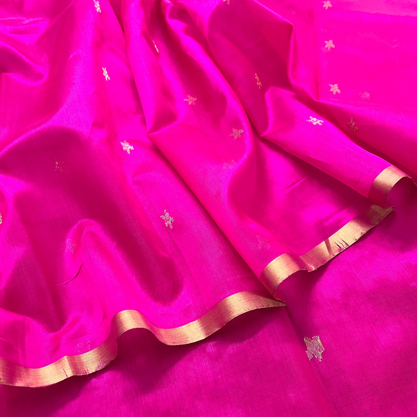 Rani pink chanderi silk saree with flower bootis all over