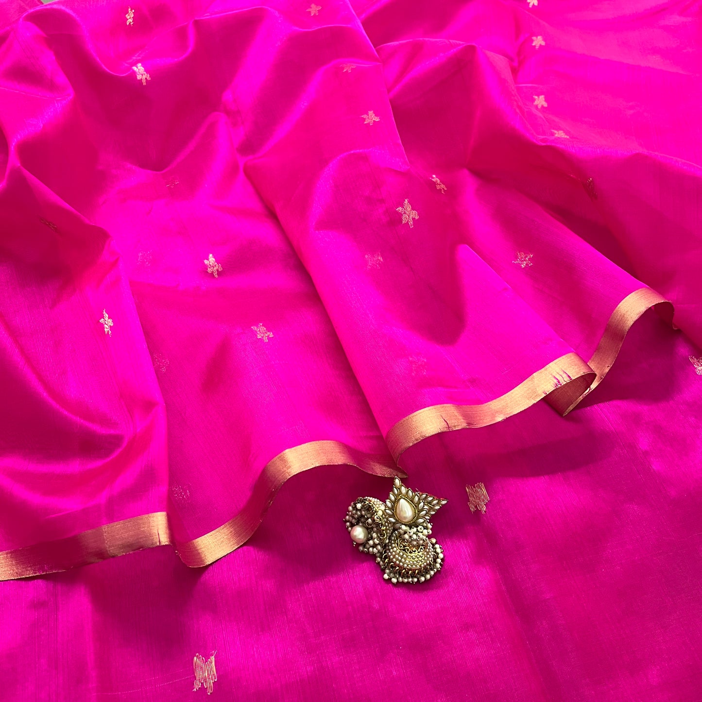 Rani pink chanderi silk saree with flower bootis all over
