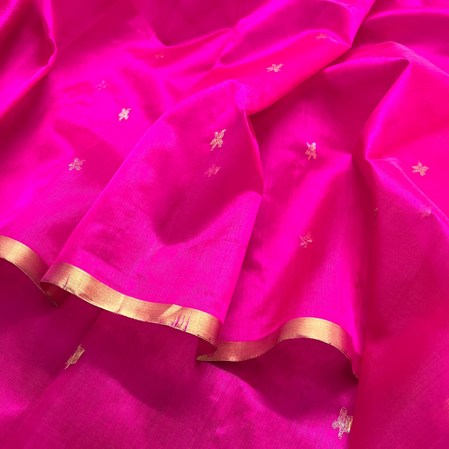 Rani pink chanderi silk saree with flower bootis all over
