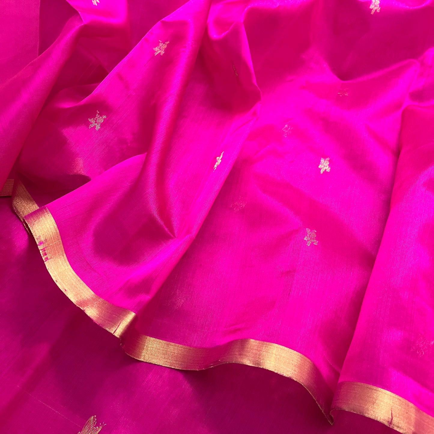 Rani pink chanderi silk saree with flower bootis all over