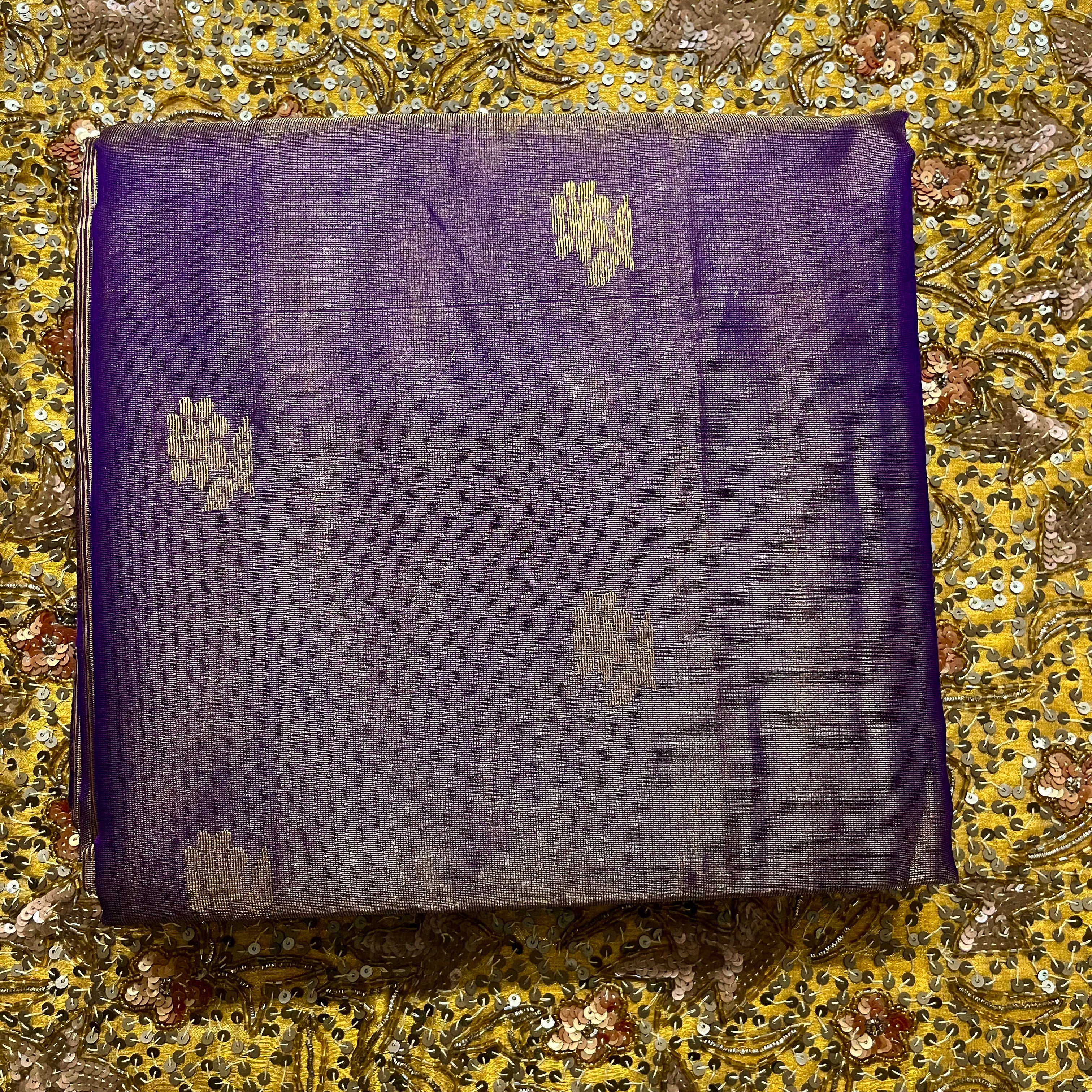 Dark purple maheshwari tissue silk saree with flower motifs all over