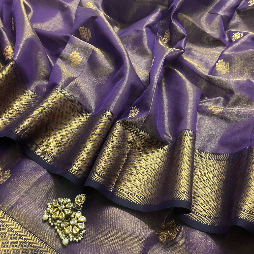 Dark purple maheshwari tissue silk saree with flower motifs all over