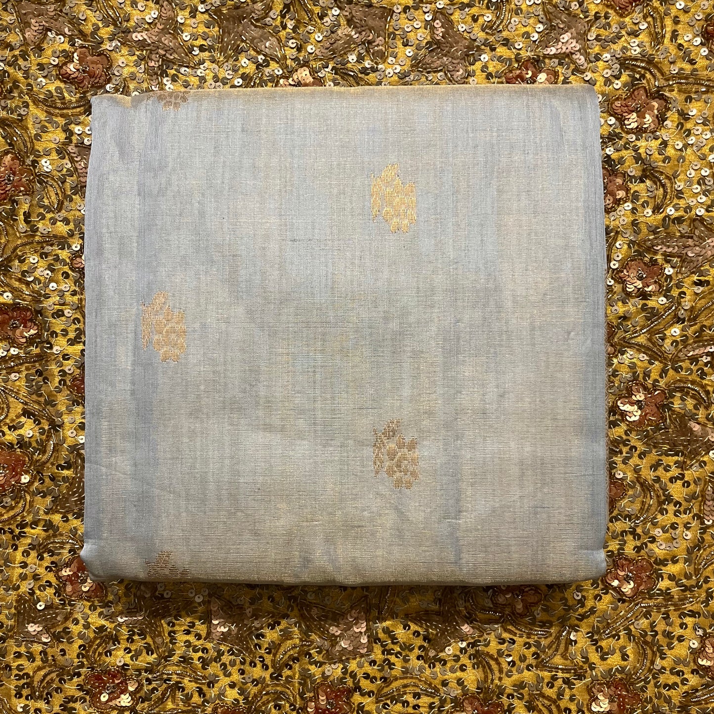 Grey gold maheshwari tissue silk saree with flower motifs all over