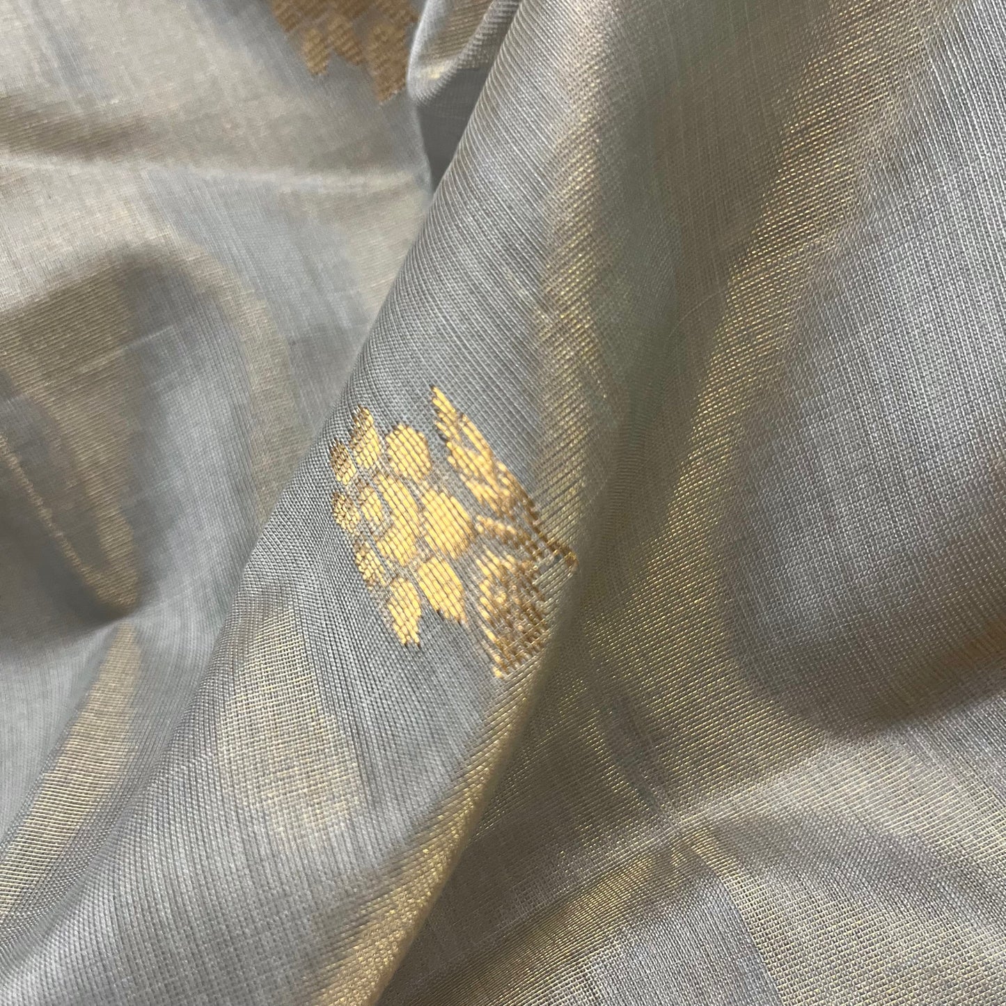 Grey gold maheshwari tissue silk saree with flower motifs all over