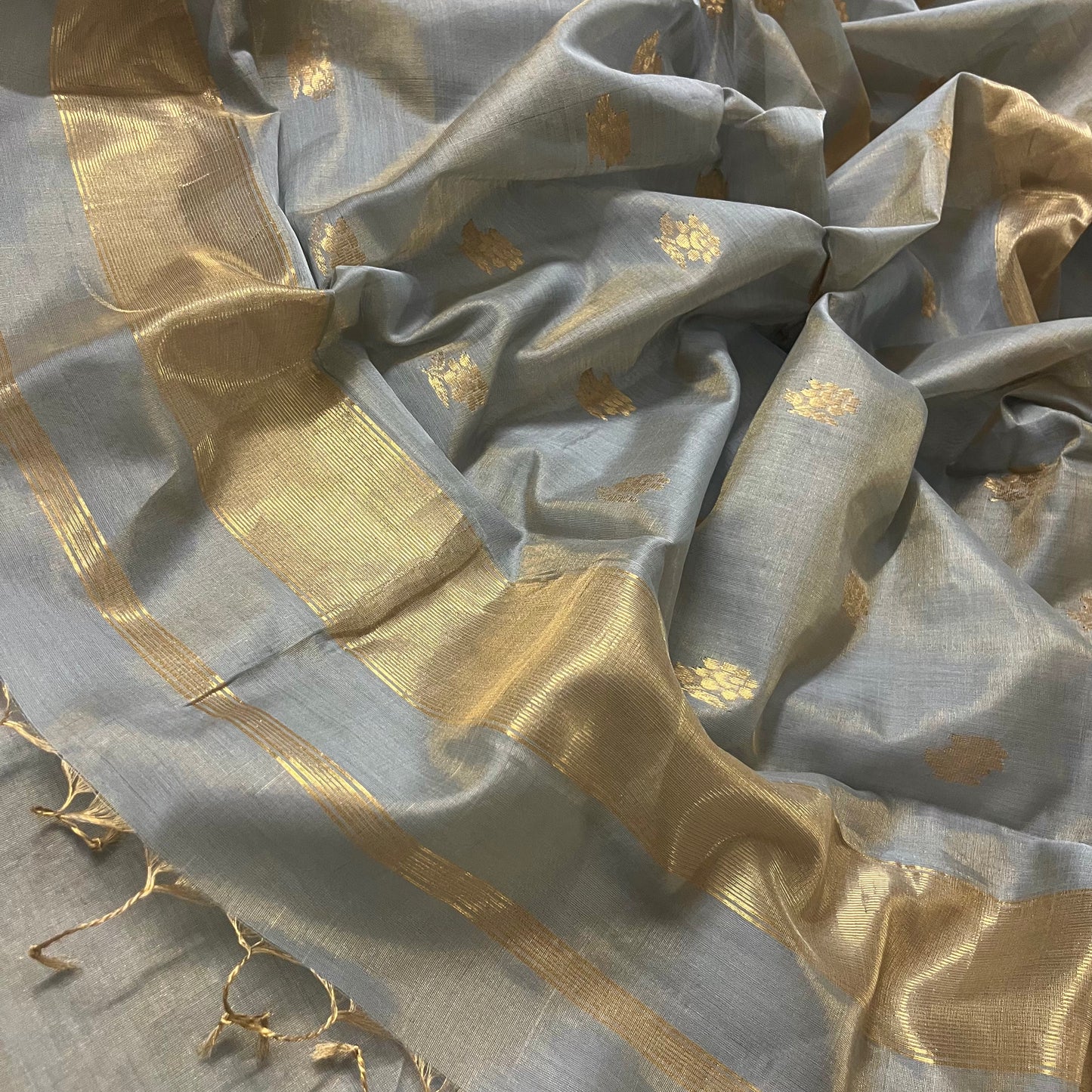 Grey gold maheshwari tissue silk saree with flower motifs all over
