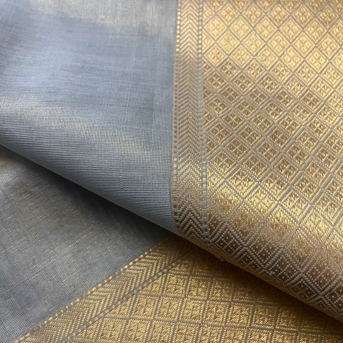 Grey gold maheshwari tissue silk saree with flower motifs all over