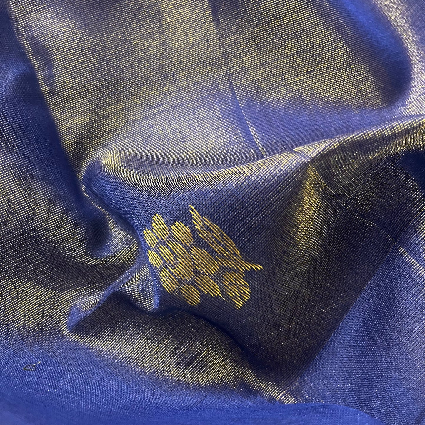 Dark blue maheshwari tissue silk saree with flower motifs all over