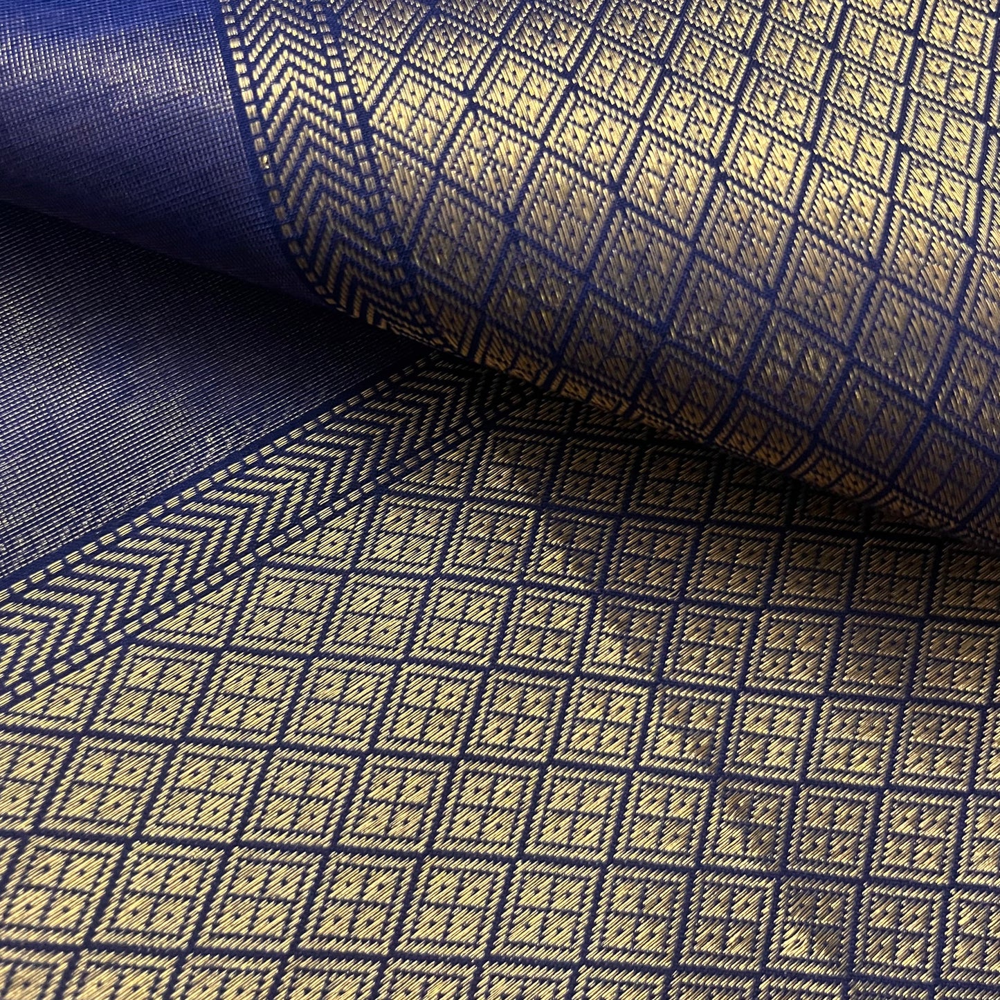 Dark blue maheshwari tissue silk saree with flower motifs all over