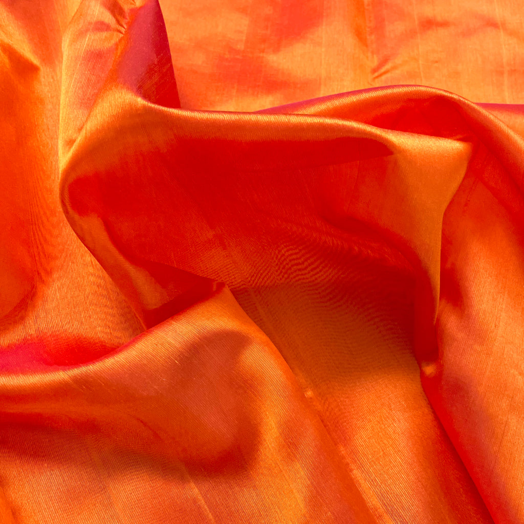 Sunset orange chanderi silk saree with silk border