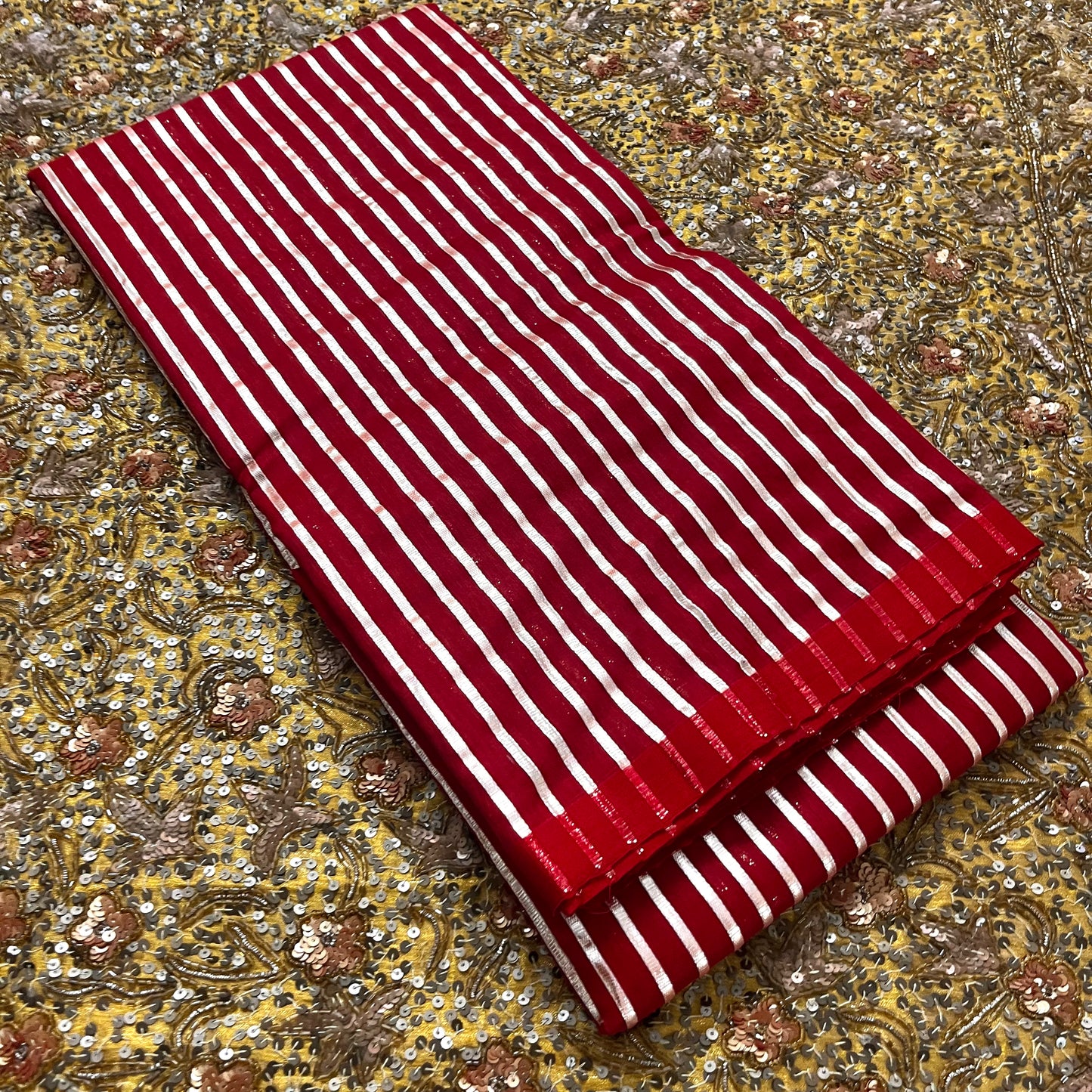 Deep red chanderi saree with intricate gota work all over