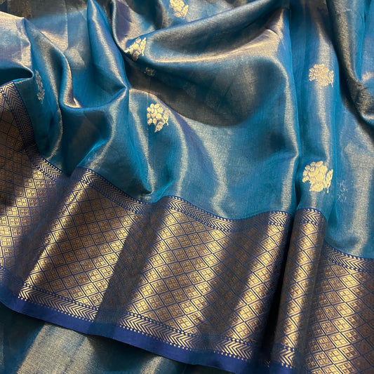 Yellow maheshwari tissue silk saree with flower motifs all over