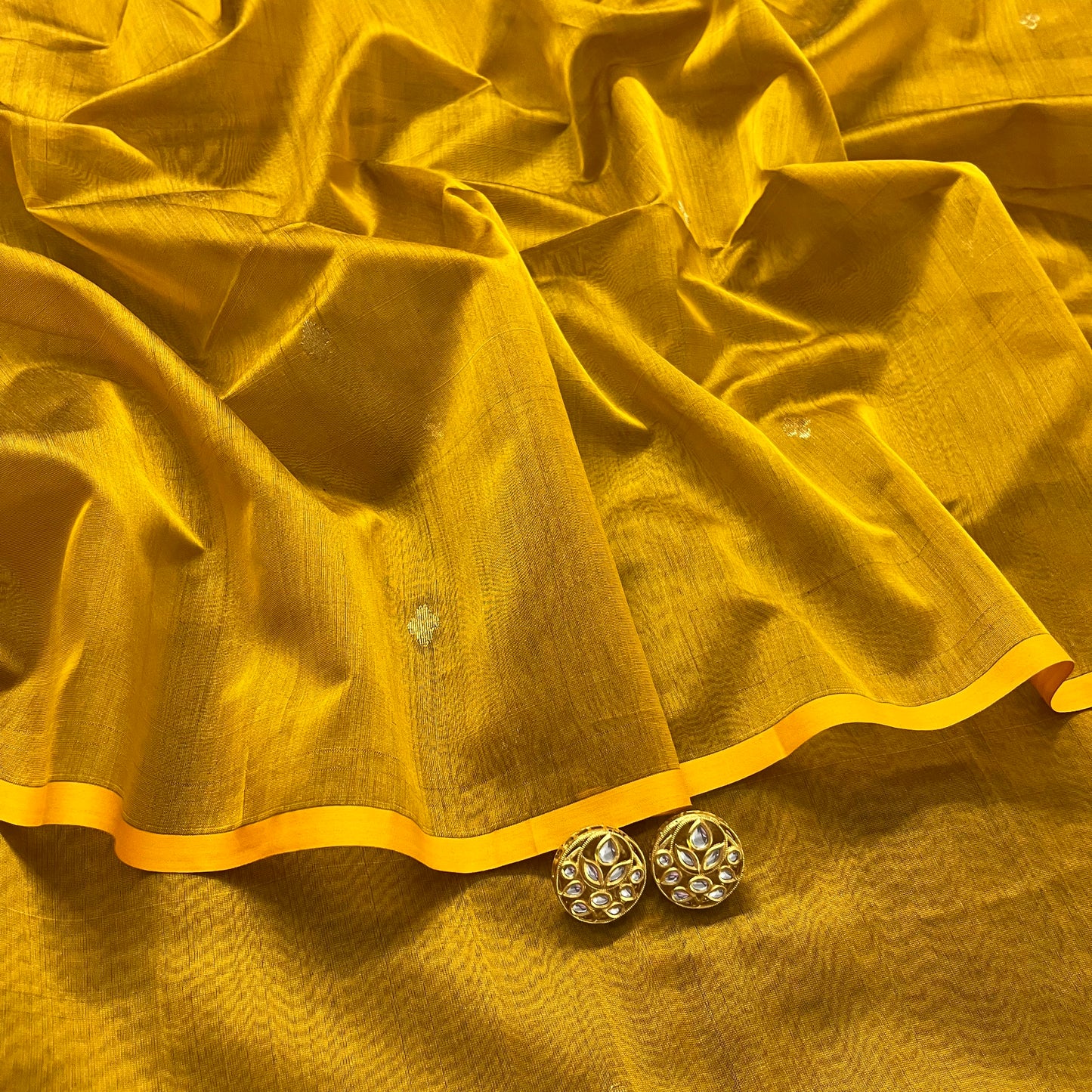 Gold mustard maheshwari saree with zari bootis all over