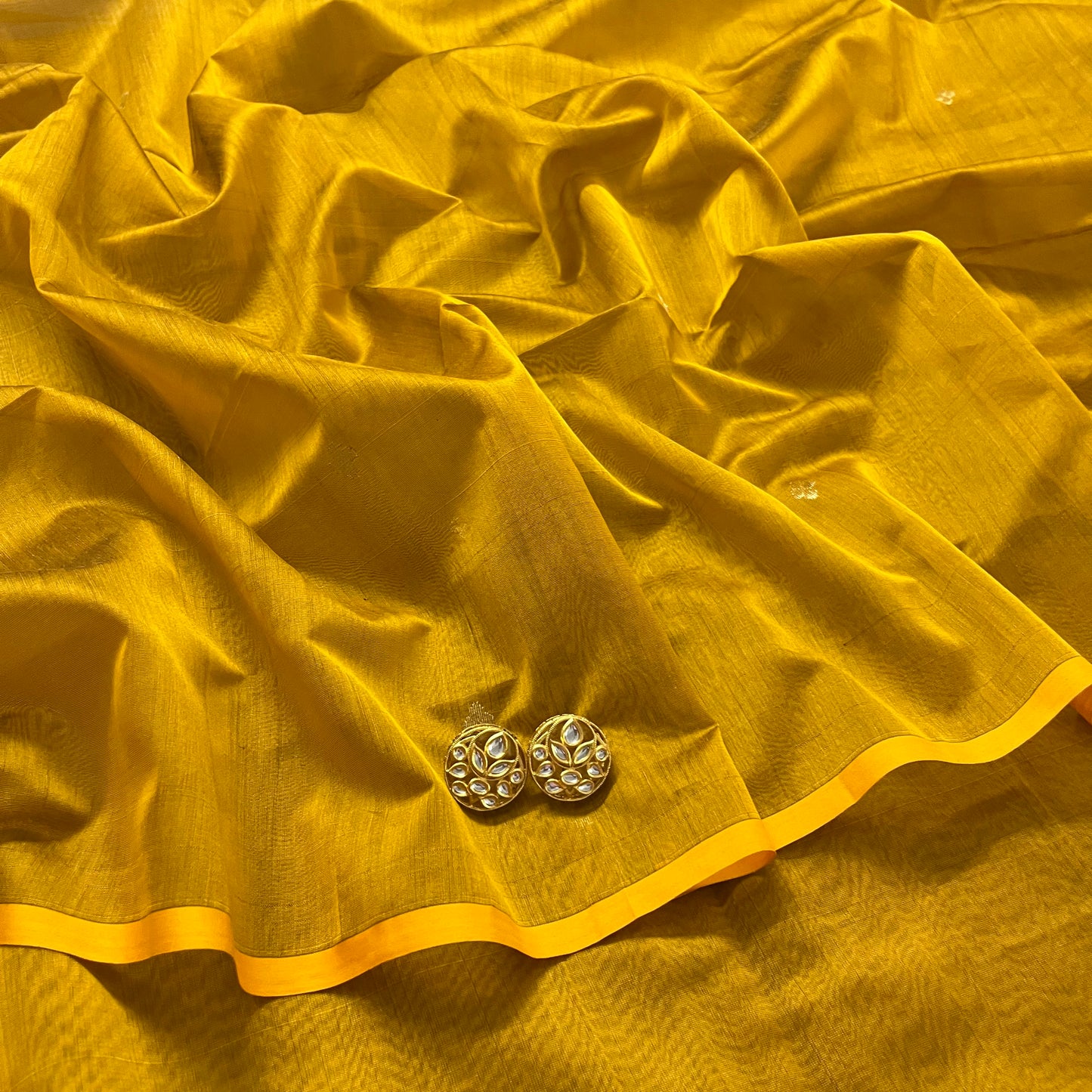 Gold mustard maheshwari saree with zari bootis all over