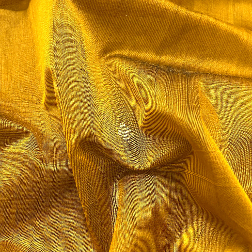 Gold mustard maheshwari saree with zari bootis all over