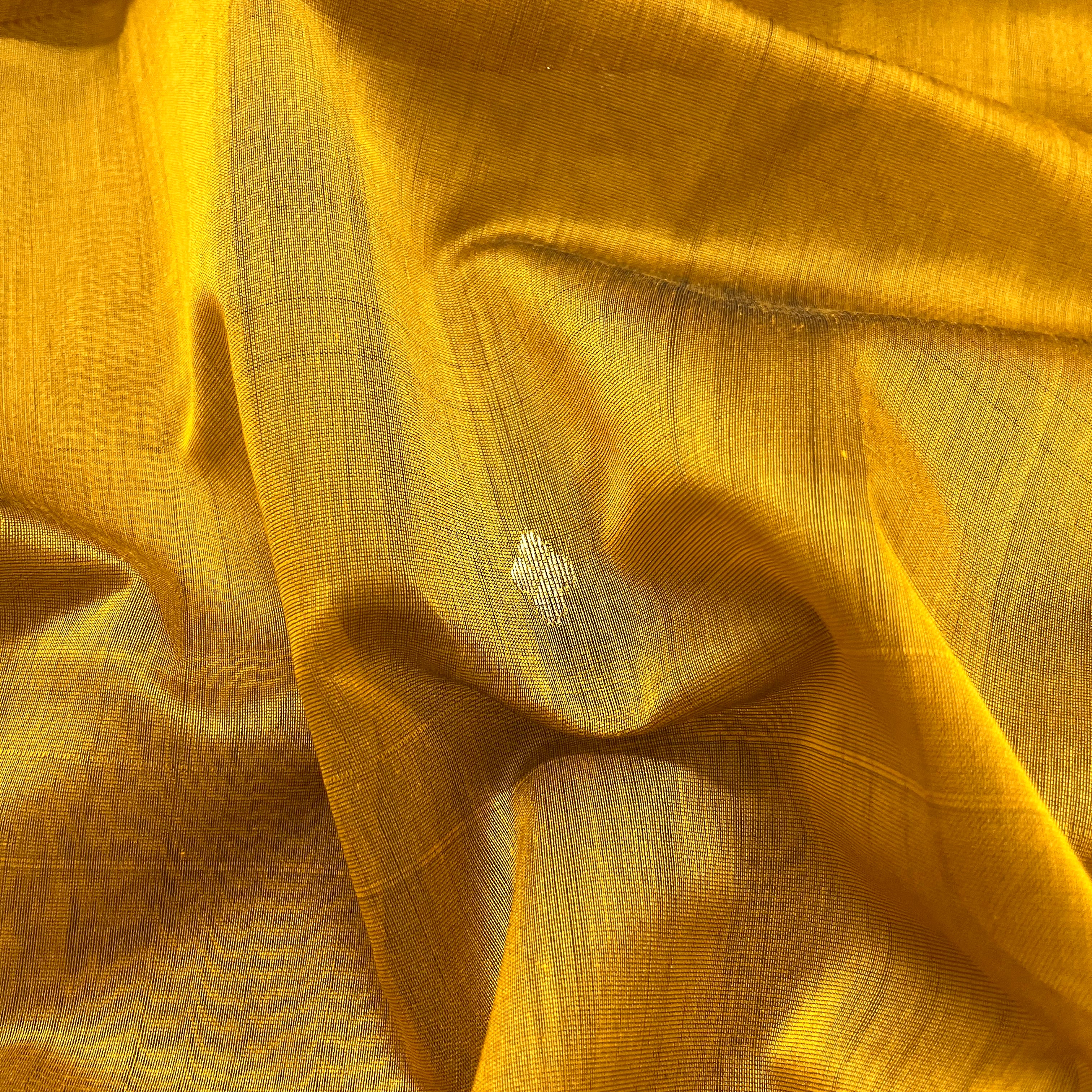 Gold mustard maheshwari saree with zari bootis all over