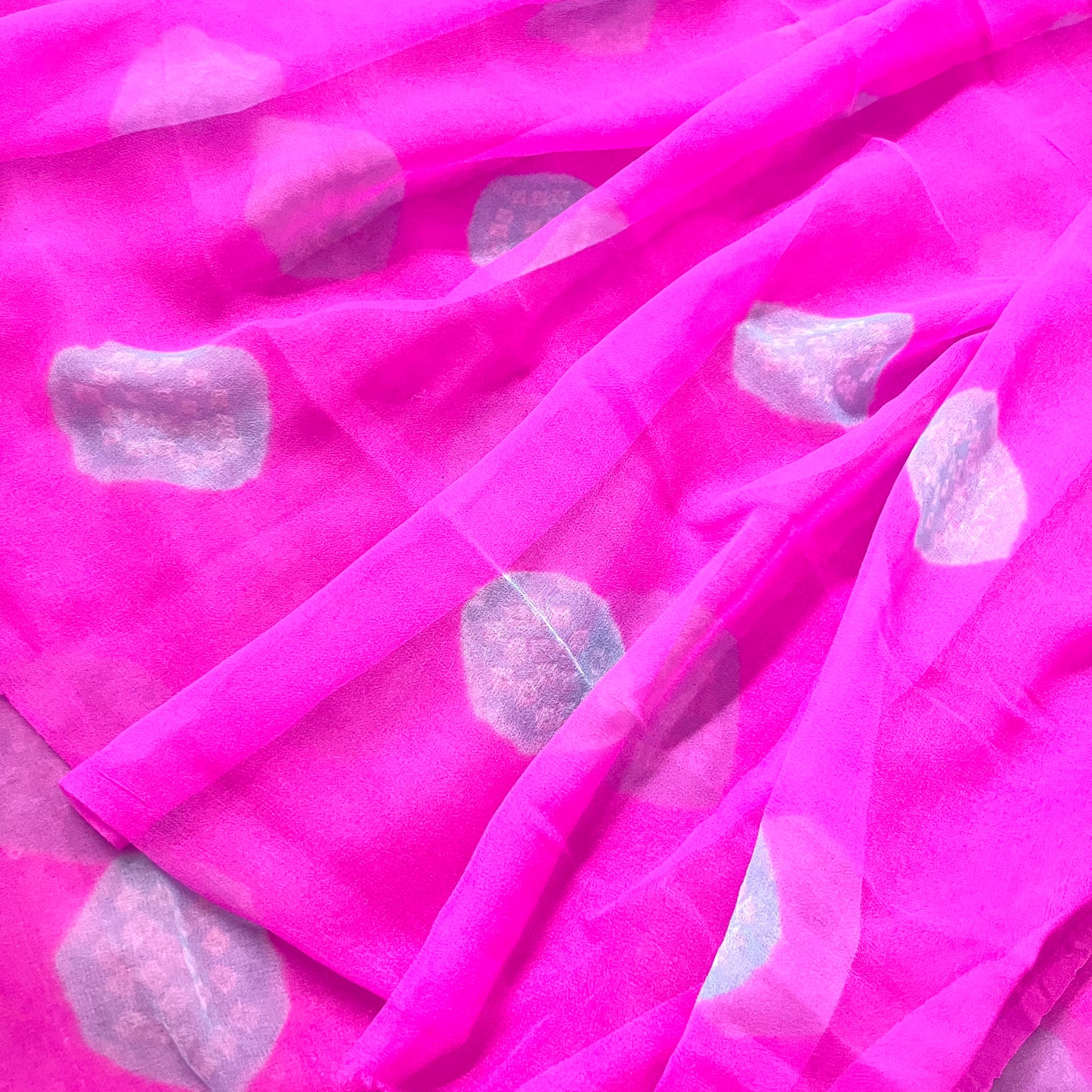 Pink and blue bandhani saree