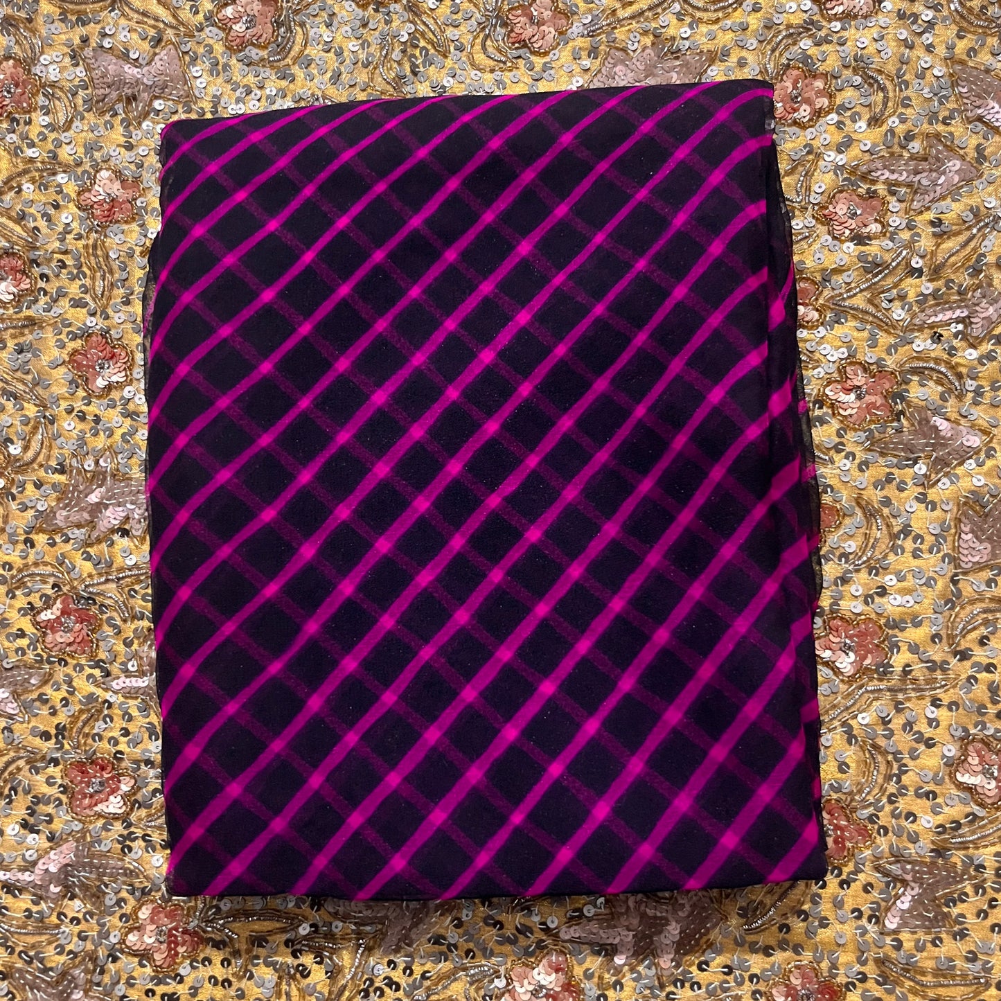 Black and pink lehariya saree