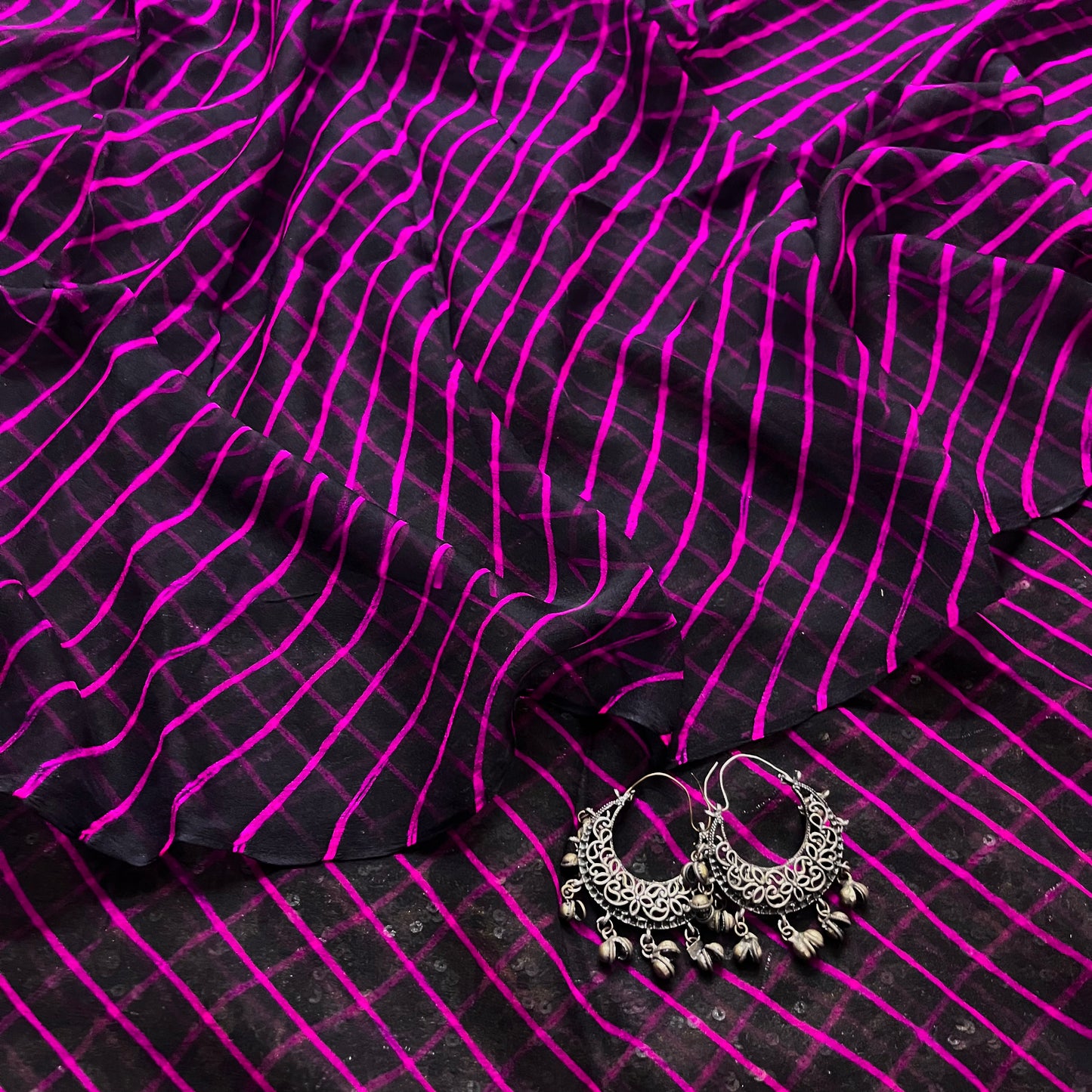 Black and pink lehariya saree