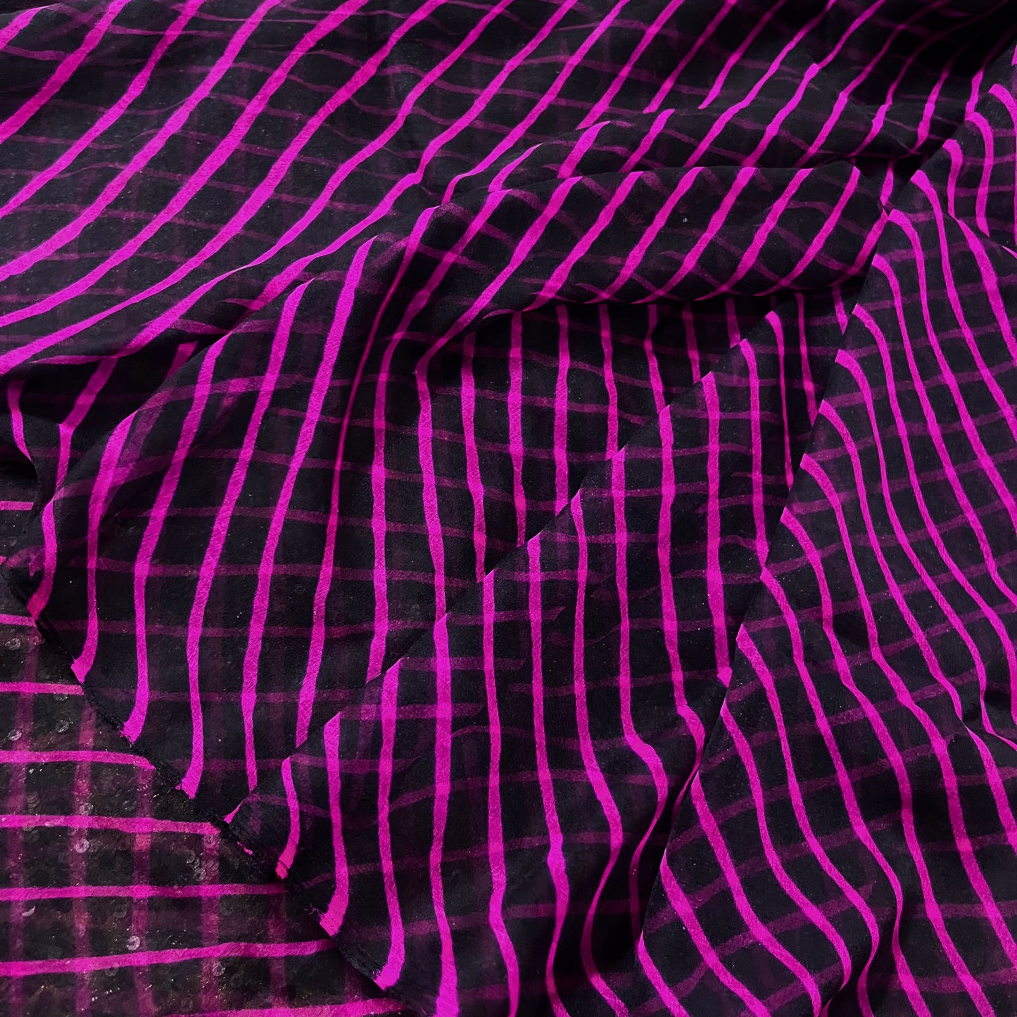 Black and pink lehariya saree