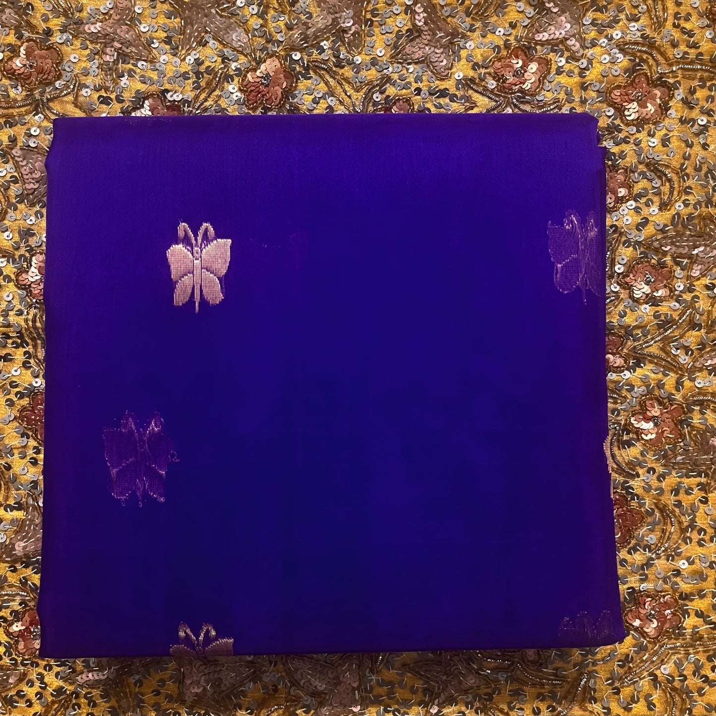 Dark purple chanderi organza silk saree with butterfly motifs all over
