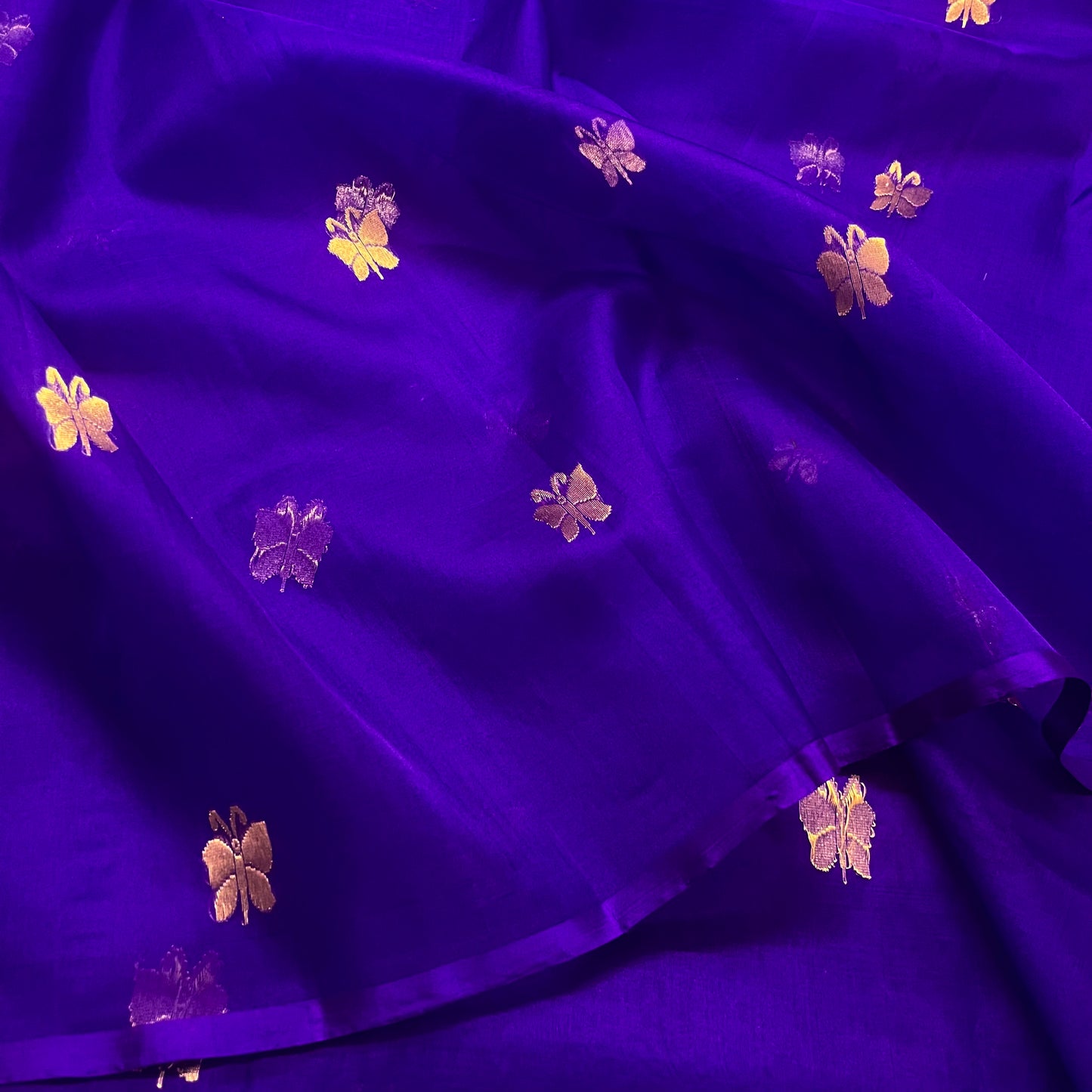 Dark purple chanderi organza silk saree with butterfly motifs all over
