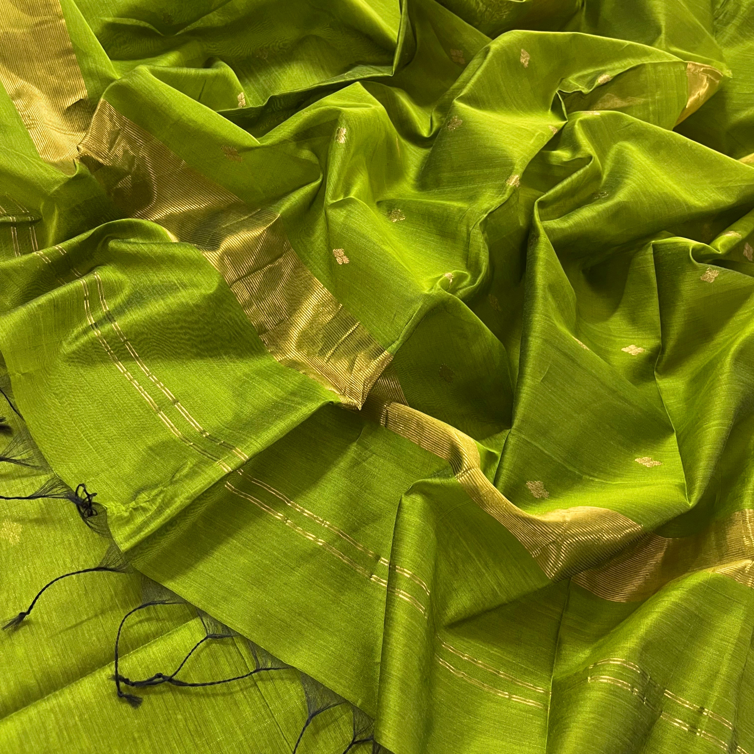 Olive green maheshwari saree with zari bootis all over