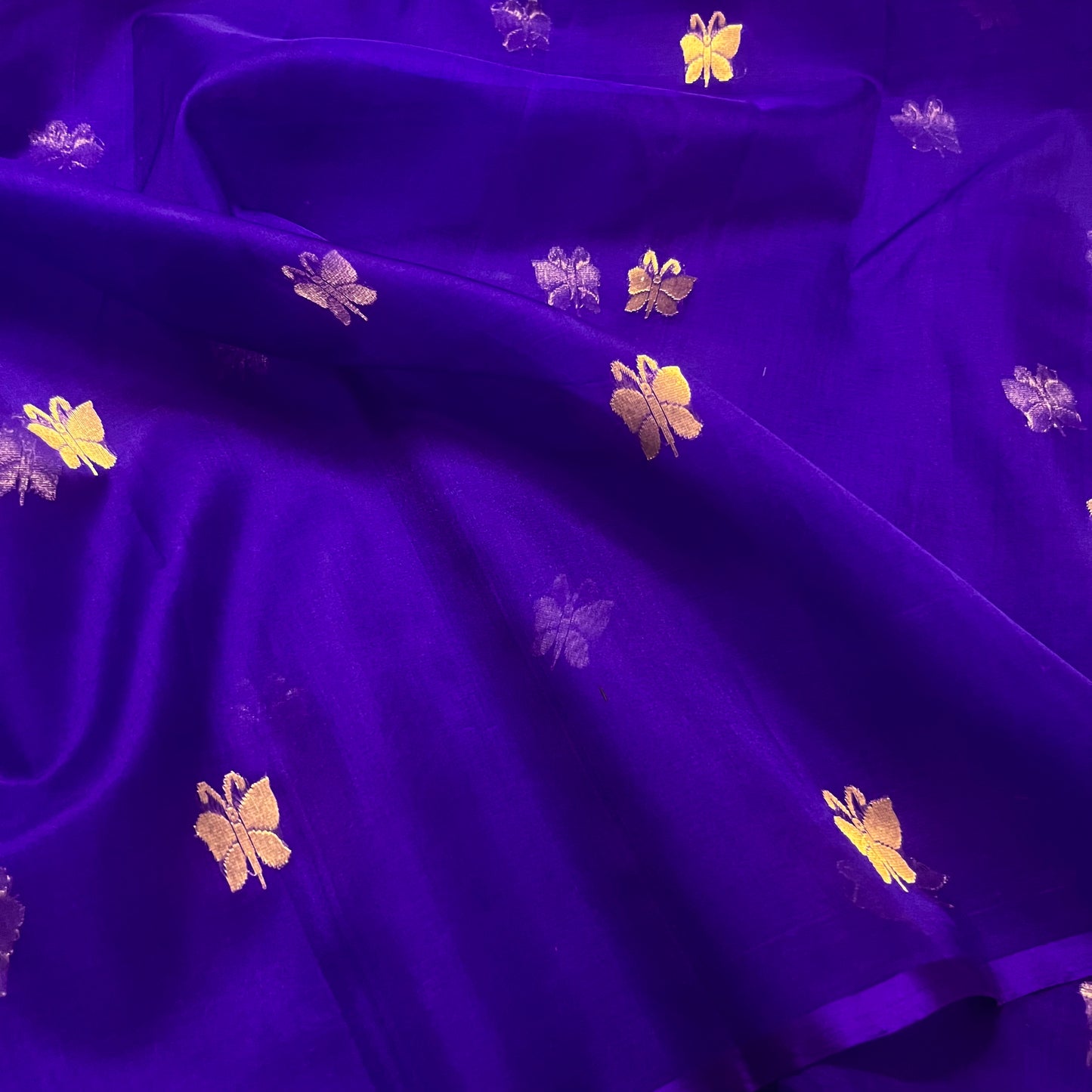 Dark purple chanderi organza silk saree with butterfly motifs all over