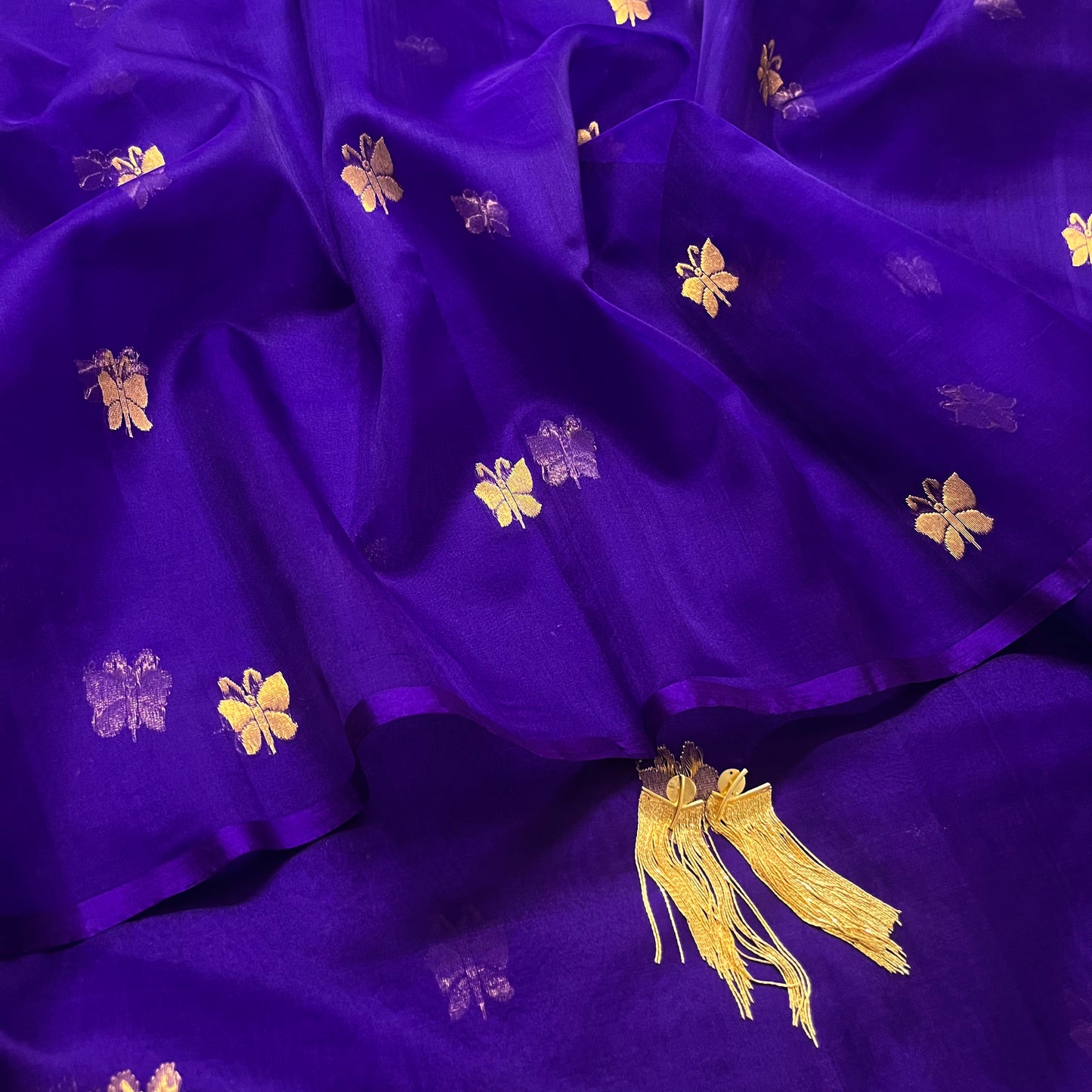 Dark purple chanderi organza silk saree with butterfly motifs all over