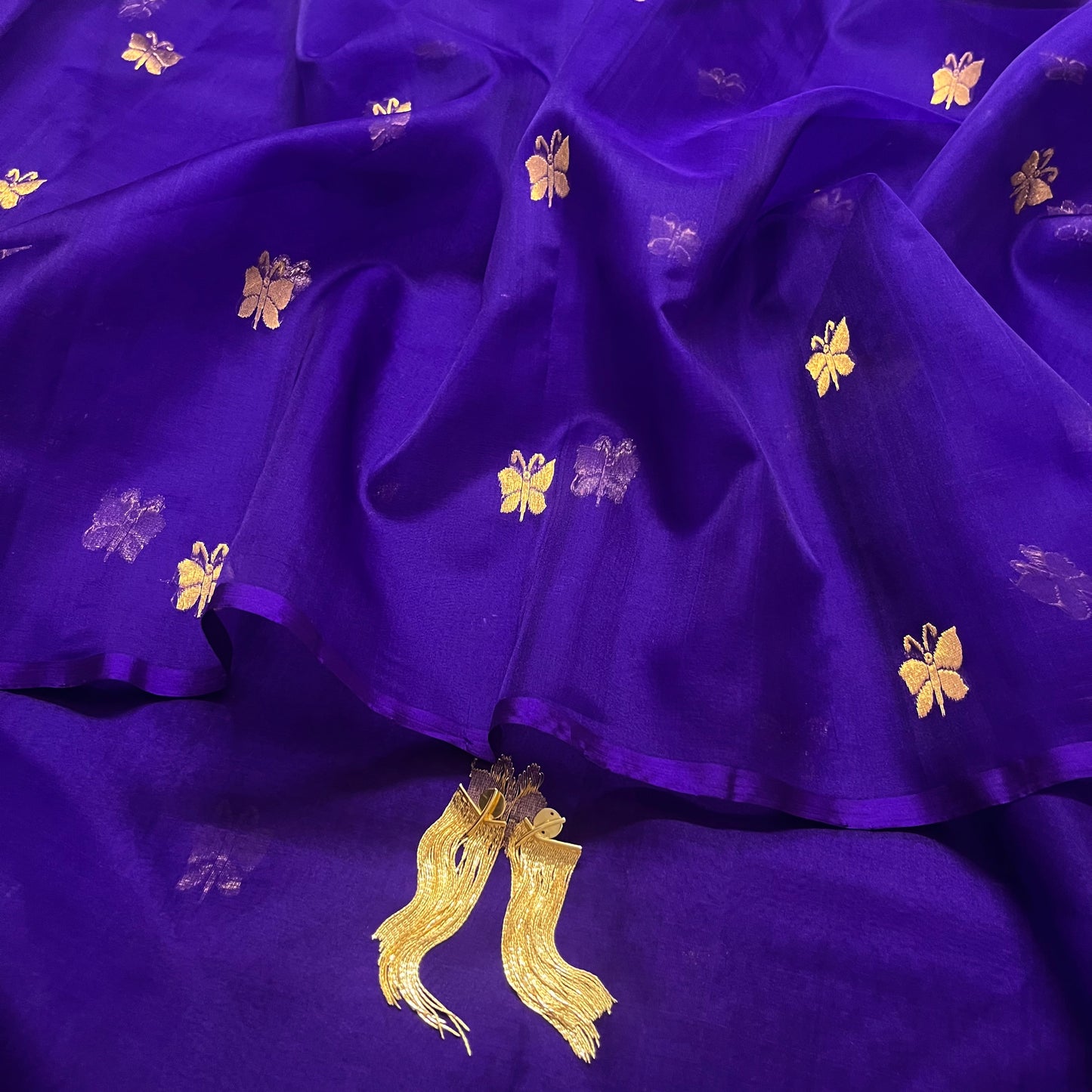 Dark purple chanderi organza silk saree with butterfly motifs all over