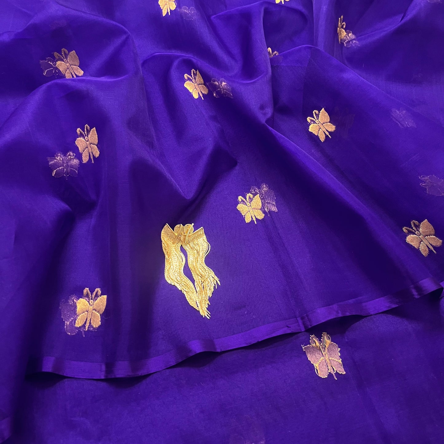 Dark purple chanderi organza silk saree with butterfly motifs all over
