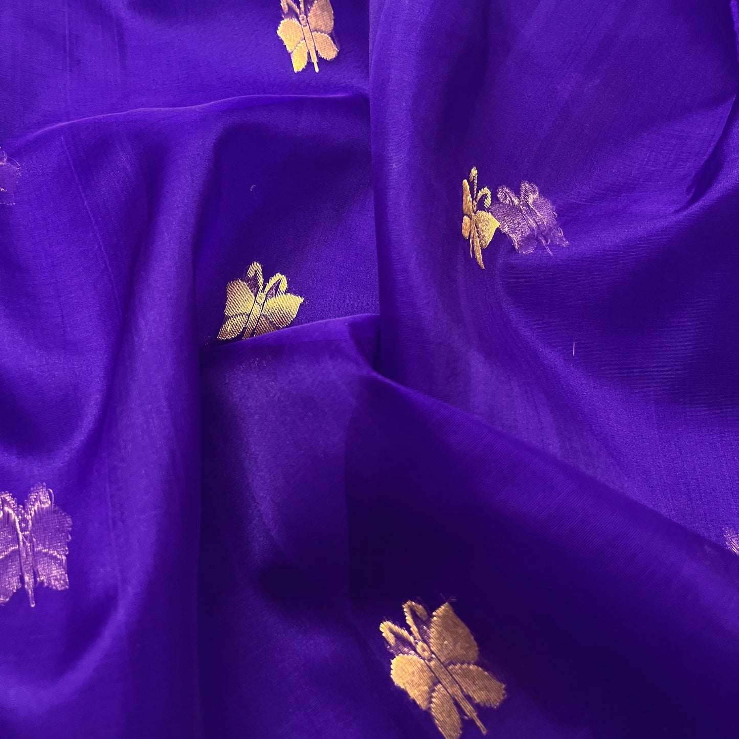 Dark purple chanderi organza silk saree with butterfly motifs all over