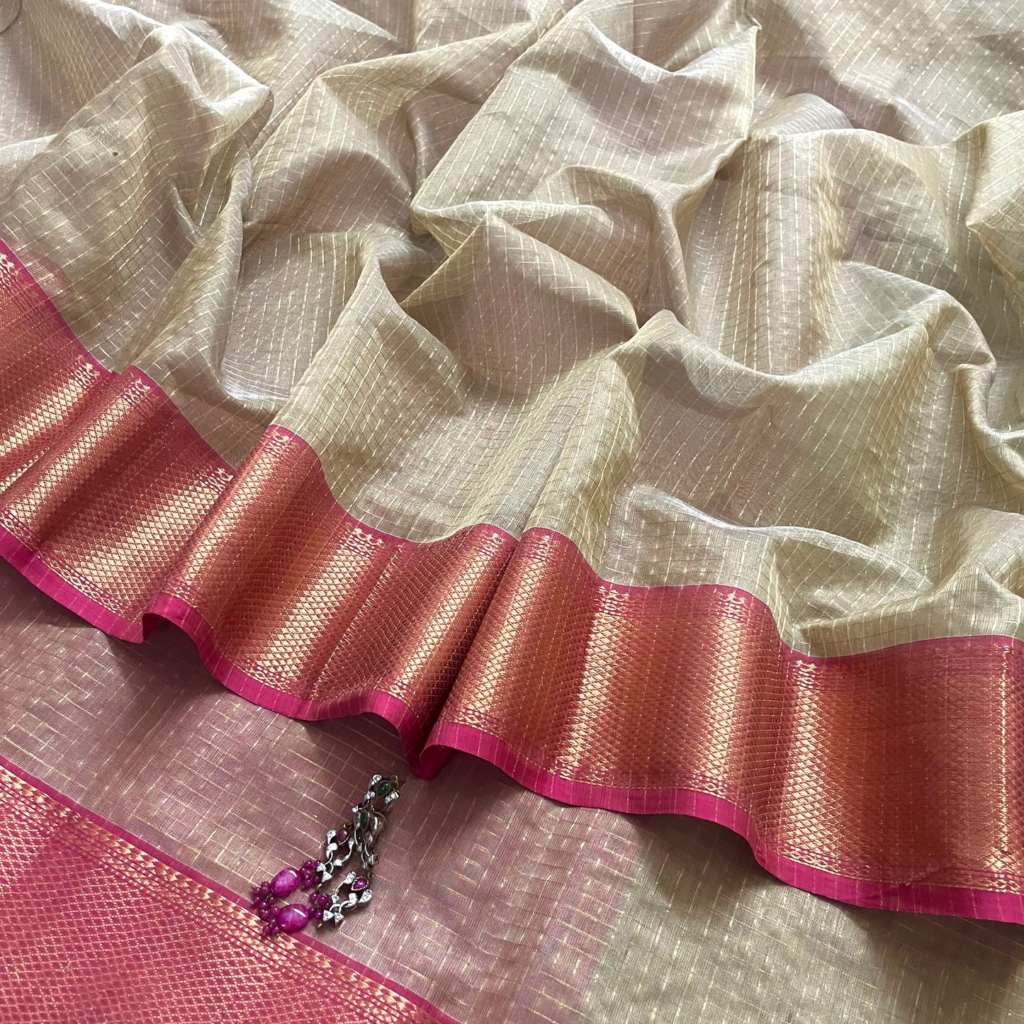Antique gold and pink maheshwari saree with zari checks all over