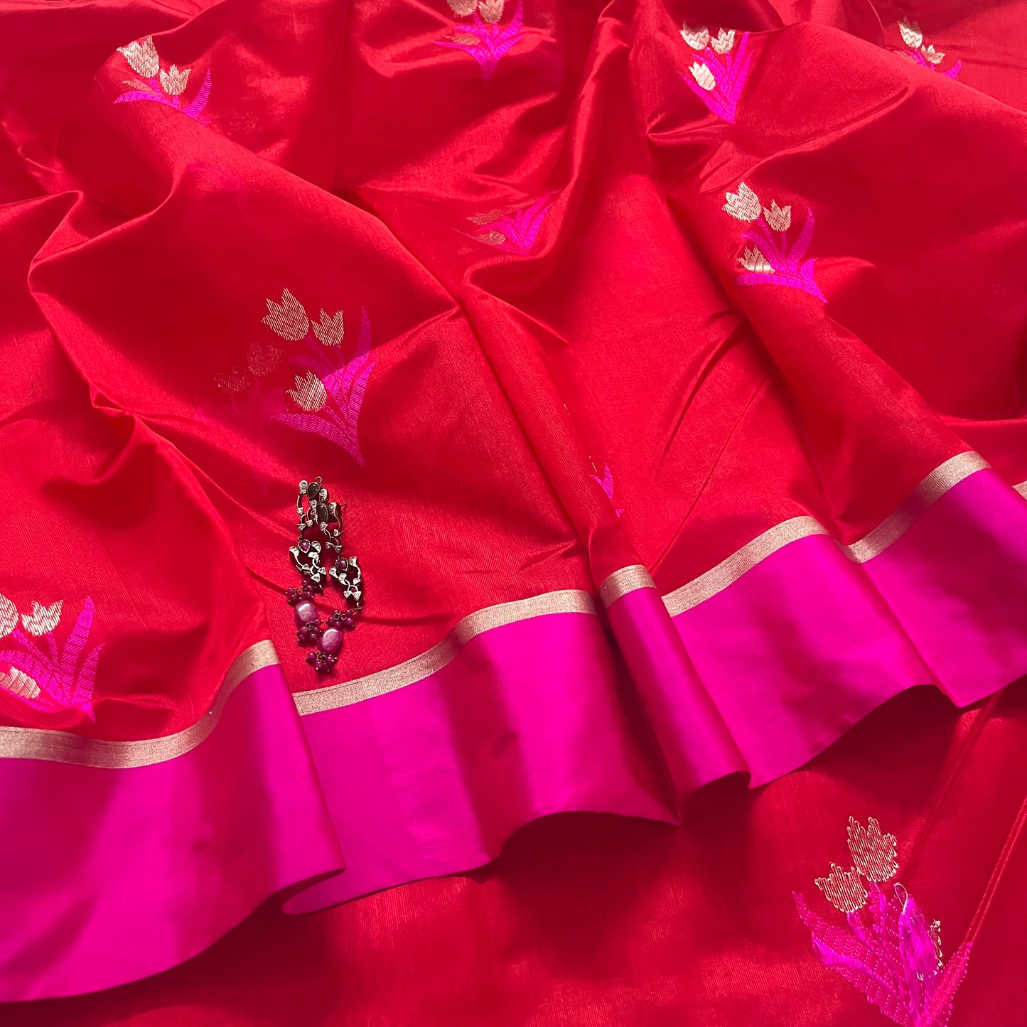 Red and pink chanderi saree with flower motifs all over