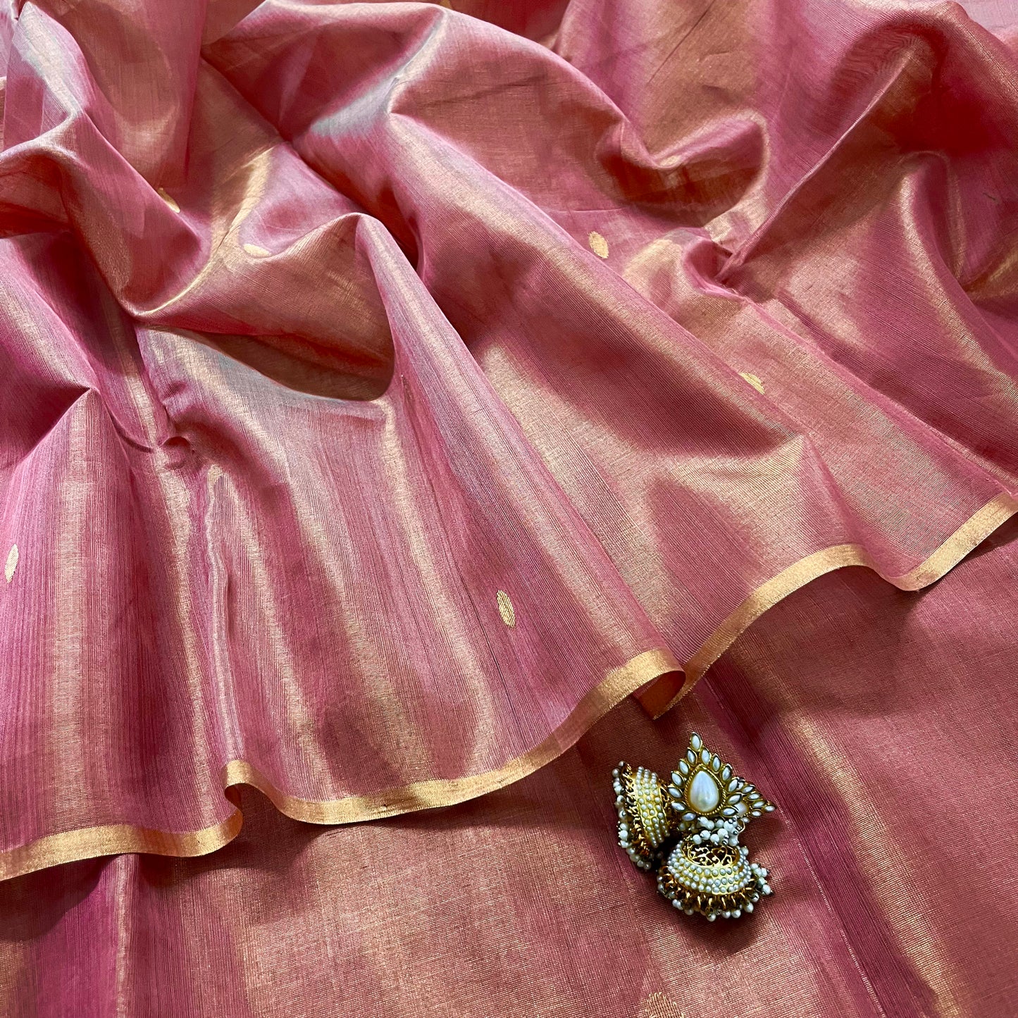 Rose and gold Maheshwari tissue silk saree with zari bootis all over