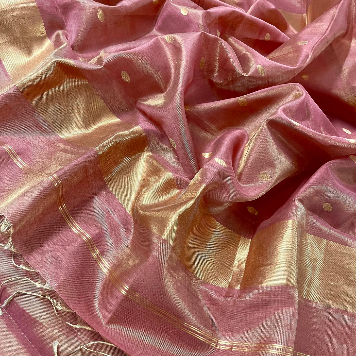 Rose and gold Maheshwari tissue silk saree with zari bootis all over