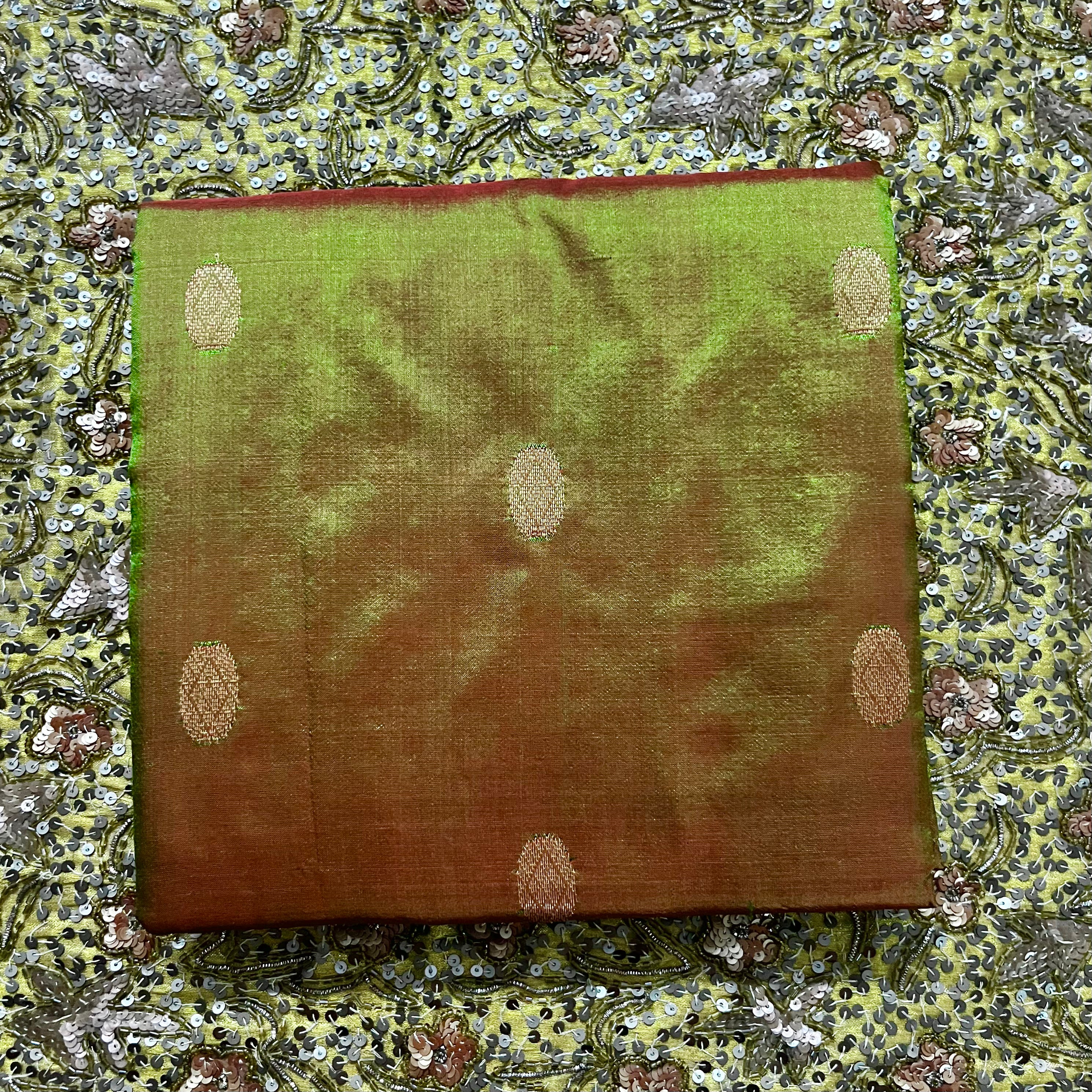 Olive green and red Maheshwari silk saree with zari bootis all over