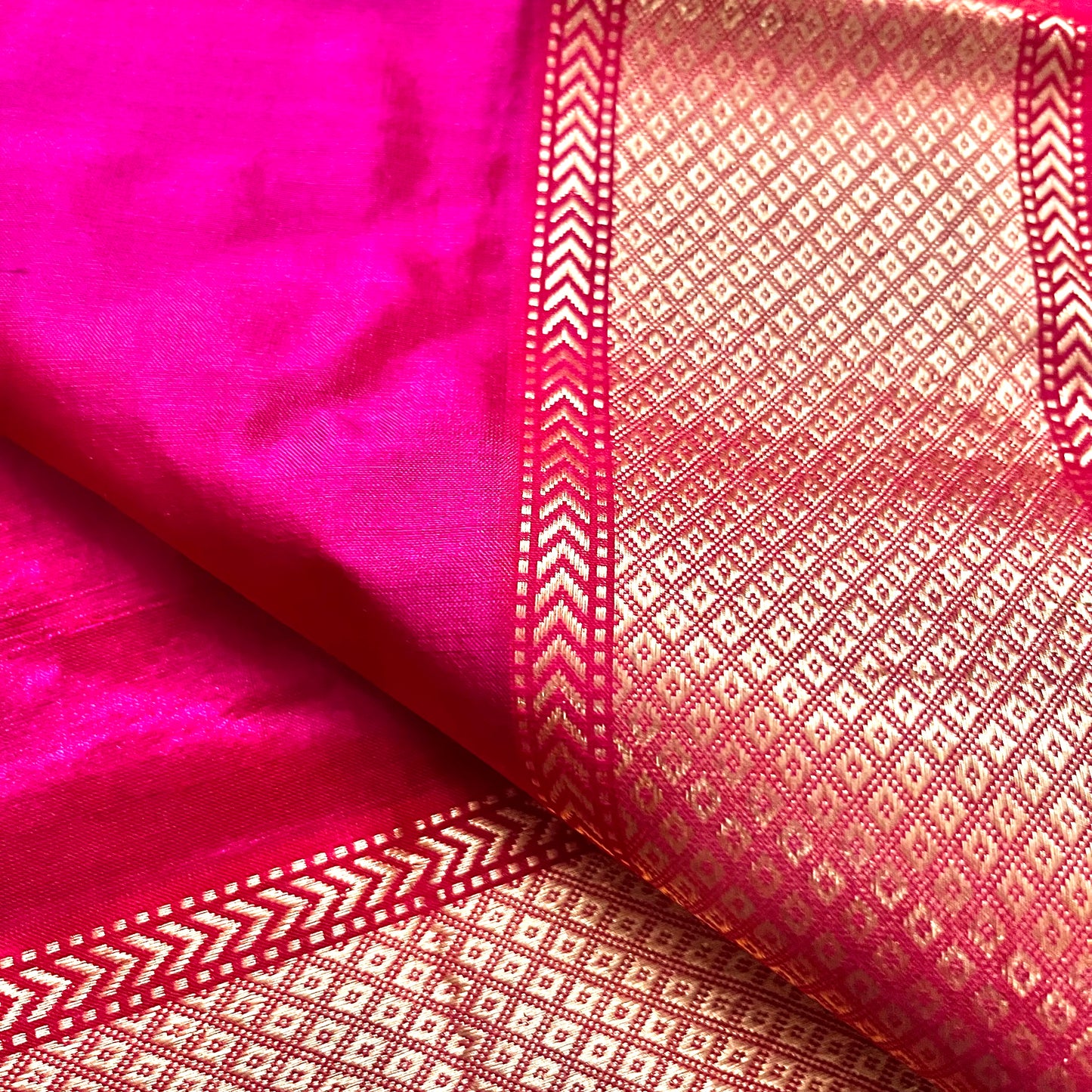 Rani pink Maheshwari silk saree with zari bootis all over